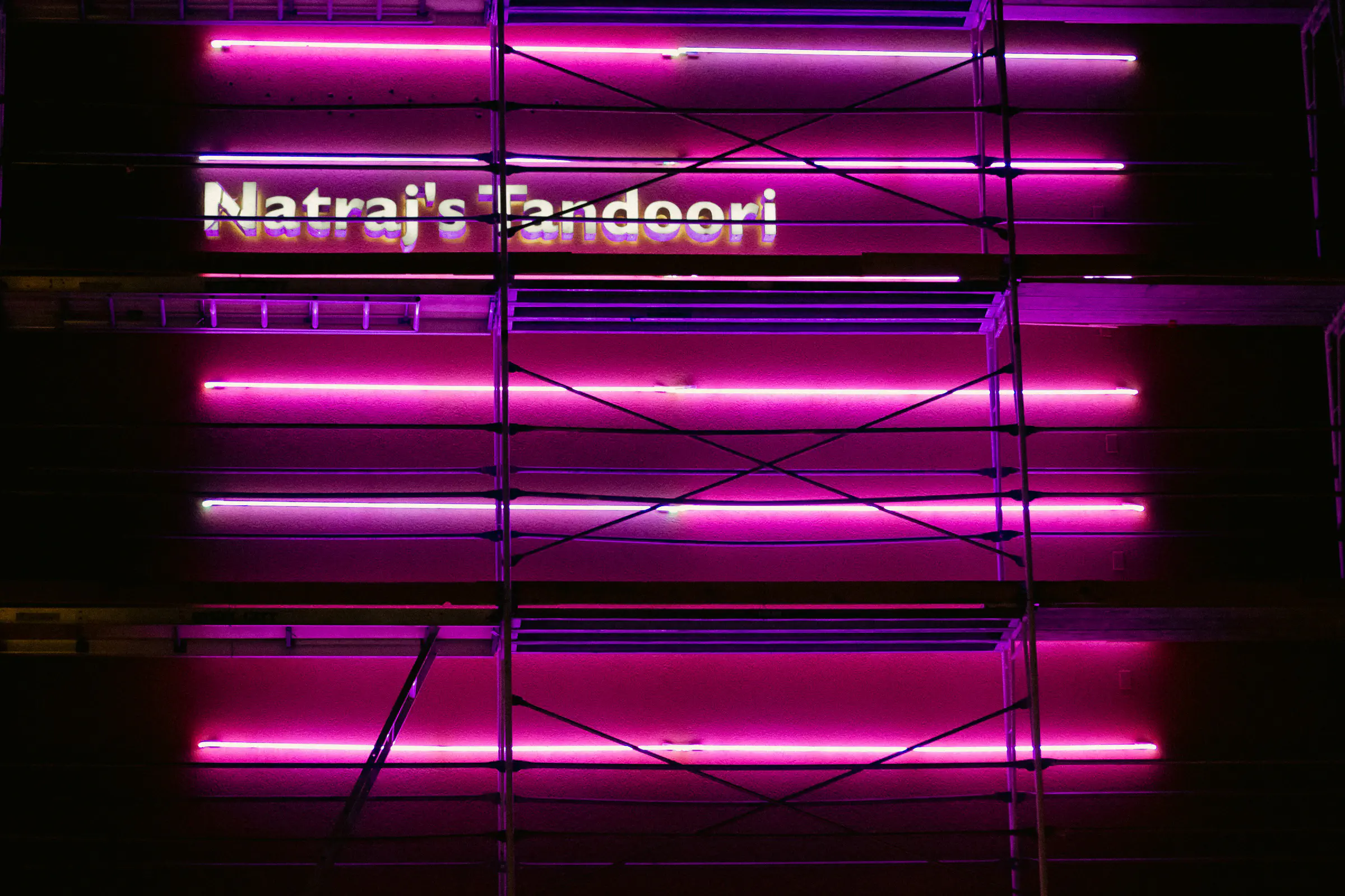 Natraj&rsquo;s Tandoori in magenta neon